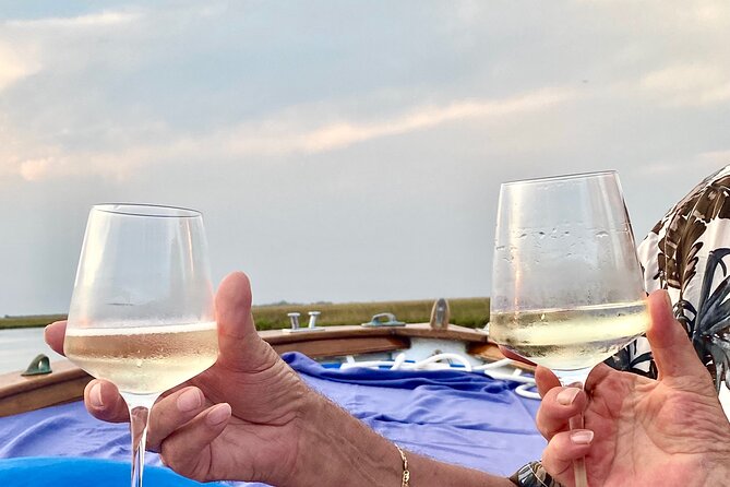 Aperitif at sunset in the Venice lagoon on a private boat. - Why this sunset ride feels different from a standard Venice cruise
