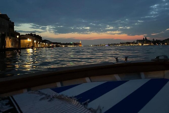 Aperitif at sunset in the Venice lagoon on a private boat. - The Venetian Arsenal and its shipbuilding past
