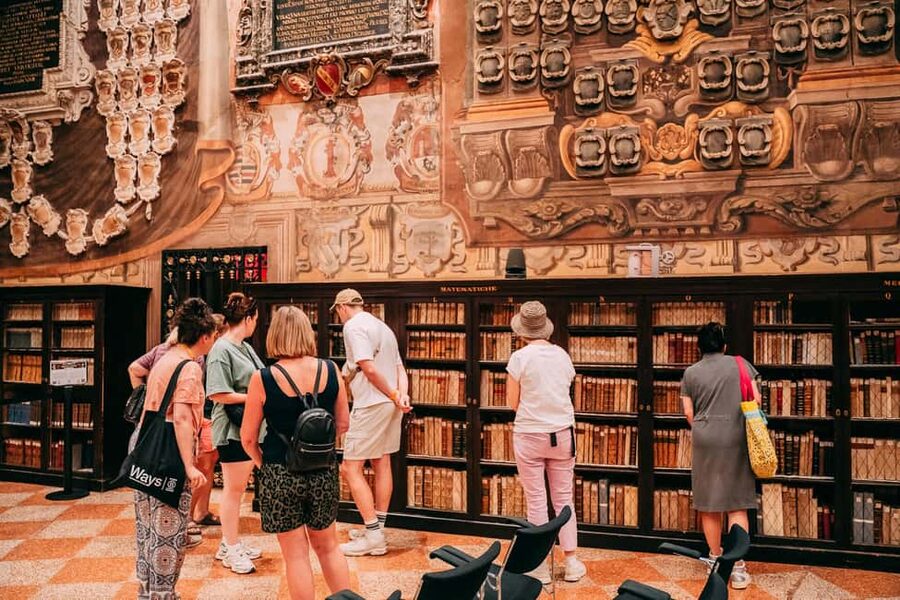 Bologna Walking tour with Tower Sky View and Archiginnasio - Porticos, food streets, and Bologna’s everyday center