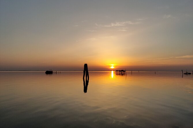 Chioggia: Sunset boat Tour in the Venetian Lagoon - The restored local boat and the small-group feel