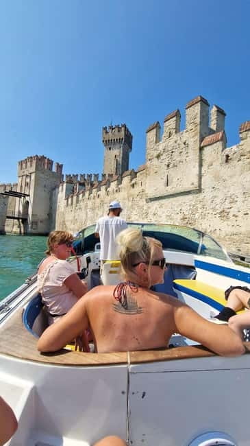 From Verona: Sirmione, Lake Garda with Boat & Spritz Tasting - What the guide and boat crew add