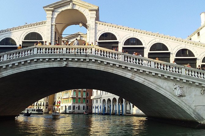 Grand Canal boat tour and Murano glass experience with Hotel pick up - Boarding the boat and mobility considerations