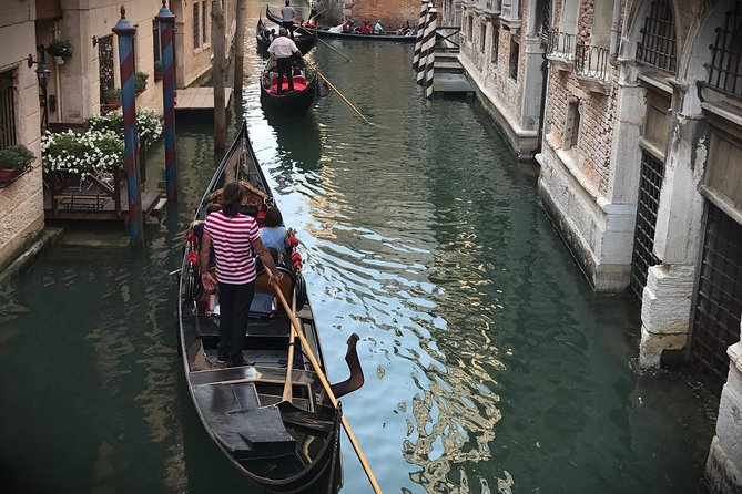 Grand Canal Gondola Experience with Live Commentary™ - A classic Venetian ride with a few strings attached