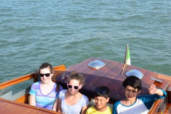 Private Arrival Transfer: Venice Train or Bus Stations to Venice Hotels - Your first Venetian boat ride from Santa Lucia