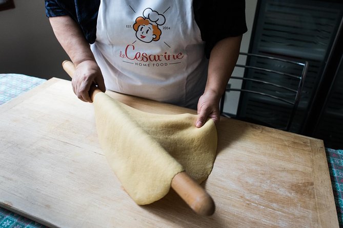 Small Group Pasta and Tiramisu Class at Local's Home in Venice - Cooking pasta in a Venetian home