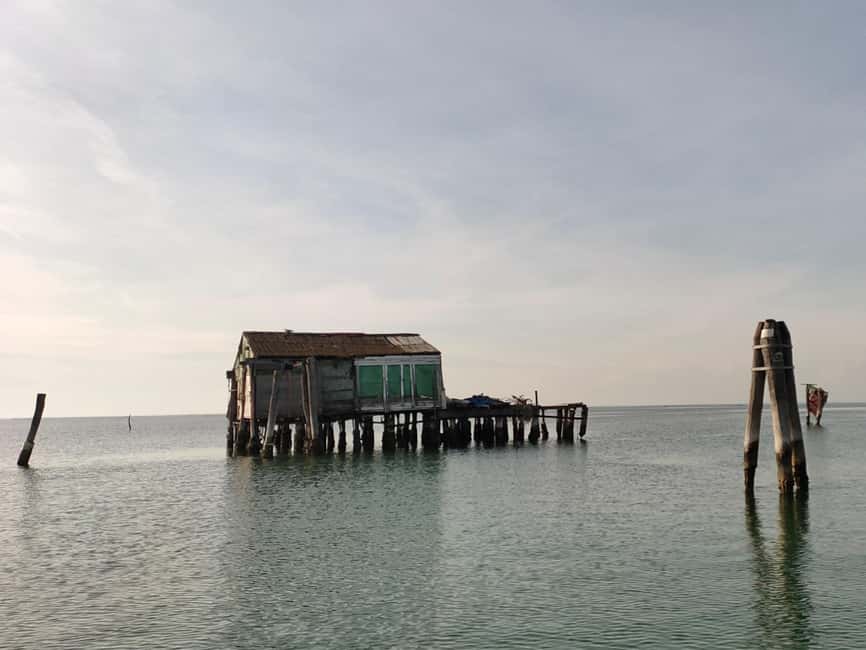 Tour to Pellestrina in a typical lagoon boat from Chioggia - Mussel Farms and Fishermen’s Stilt Houses