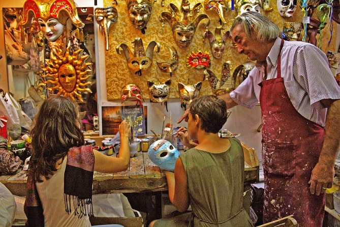 Venetian Carnival Mask Making Class in Venice, Italy - Painting a mask with an artisan’s help