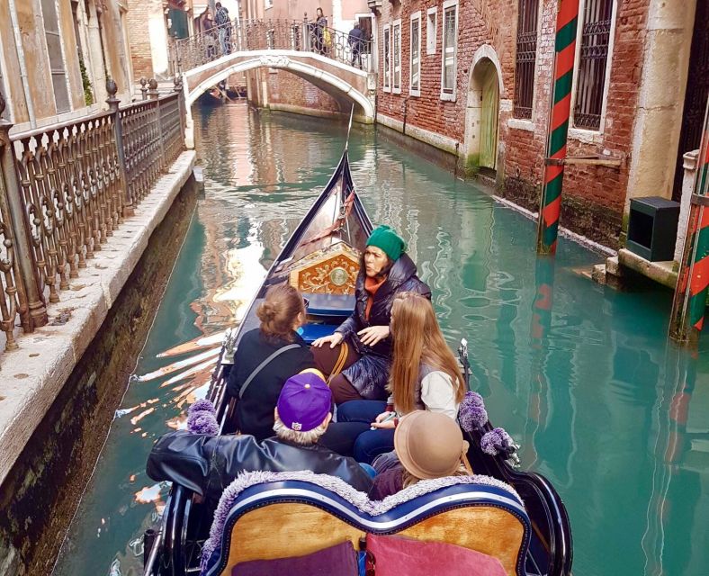 Venice: 30 min Gondola Ride on the Grand Canal with Guide - Turning into Venice’s smaller canals