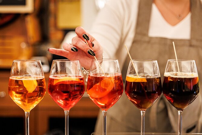 Venice Evening Food Tour: Bites, Drinks & Sit-Down Dinner - Stop one: meat cicchetti and a Select Spritz