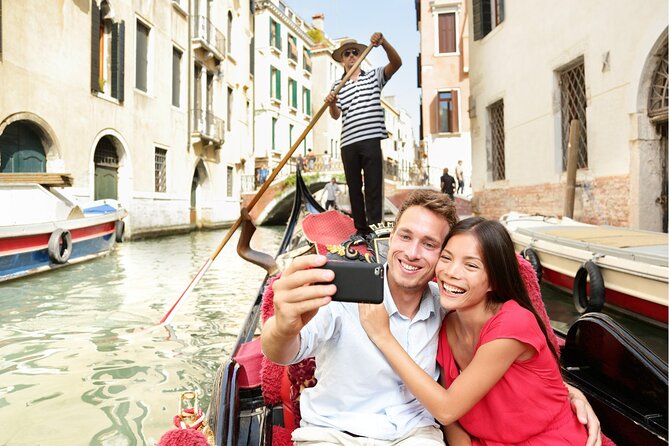 Venice Highlights with Local: Private Walking Tour & Gondola Ride - Scala Contarini del Bovolo, Venice in transition
