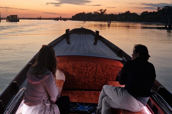 Venice Lagoon Tour with Historic Venetian Boat - The guide makes the short ride count