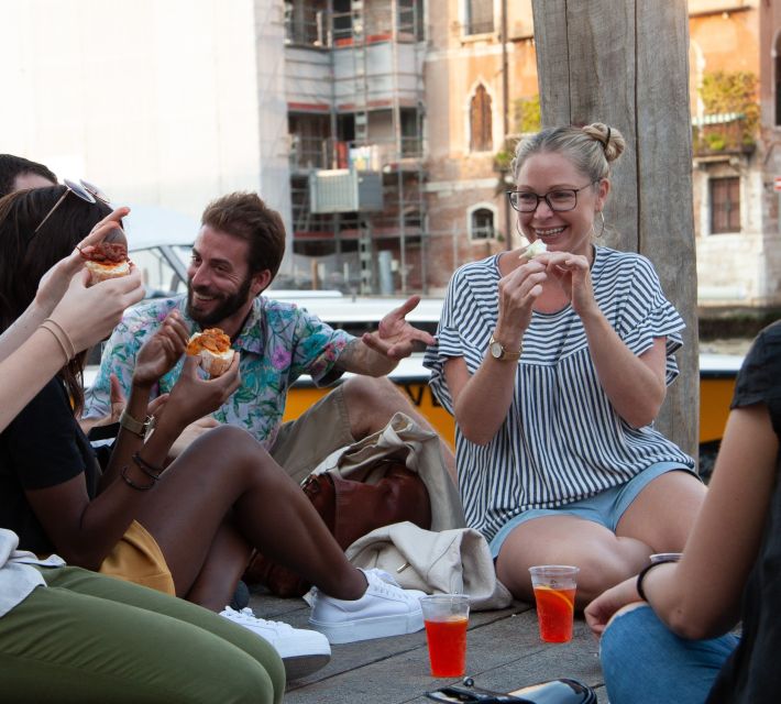 Venice: Local Secrets of Venice Tapas & Wine Walking Tour - Crossing bridges to the quieter Venice