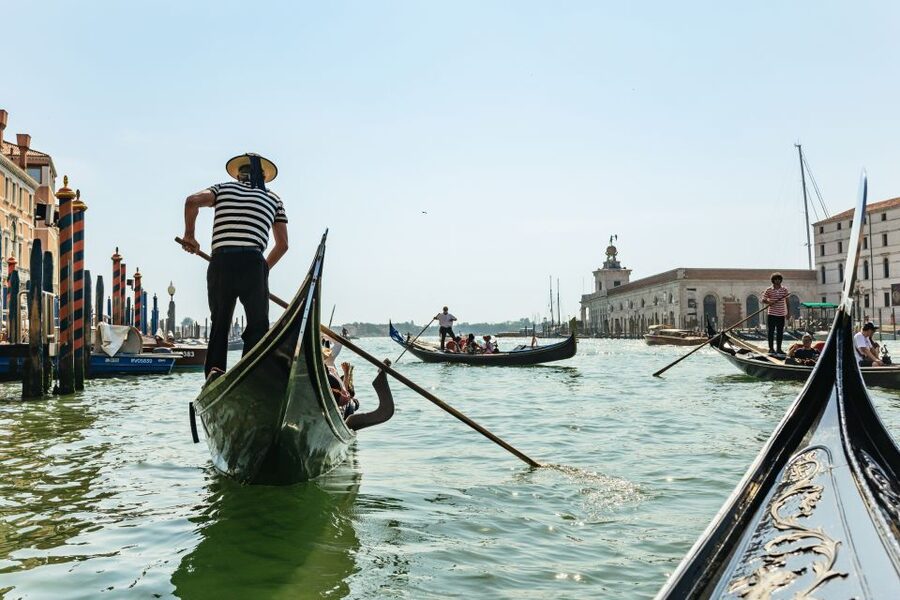 Venice: Private Gondola Ride along Grand Canal - Slipping into Venice’s smaller waterways