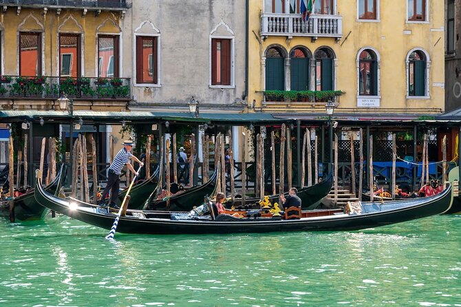 Venice Private Gondola Ride: Explore Hidden Canals and Sights - Rialto Bridge and market views from the water