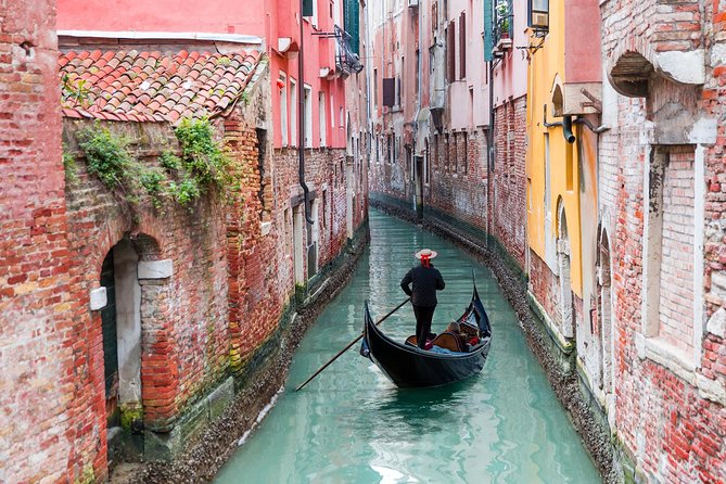 Venice Small Group Walking Tour with St. Mark's Basilica Terrace - Following the lanes toward the Bridge of Sighs