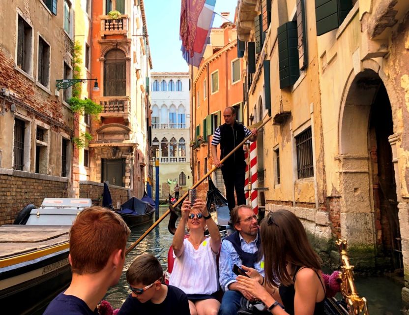 Venice Walking Tour and Gondola Ride Combo - Starting among the grand buildings of St. Mark’s Square