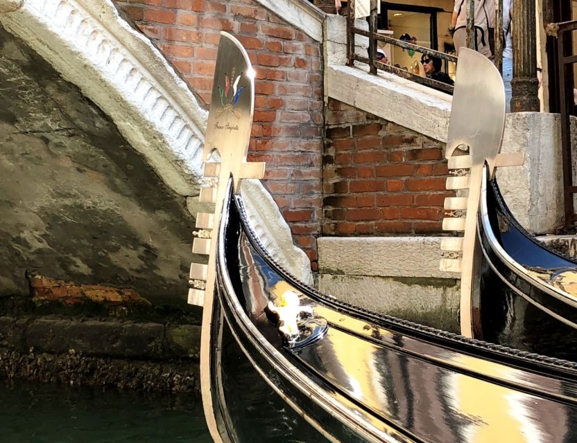 Venice Walking Tour and Gondola Ride Combo - Boarding the gondola for the second half