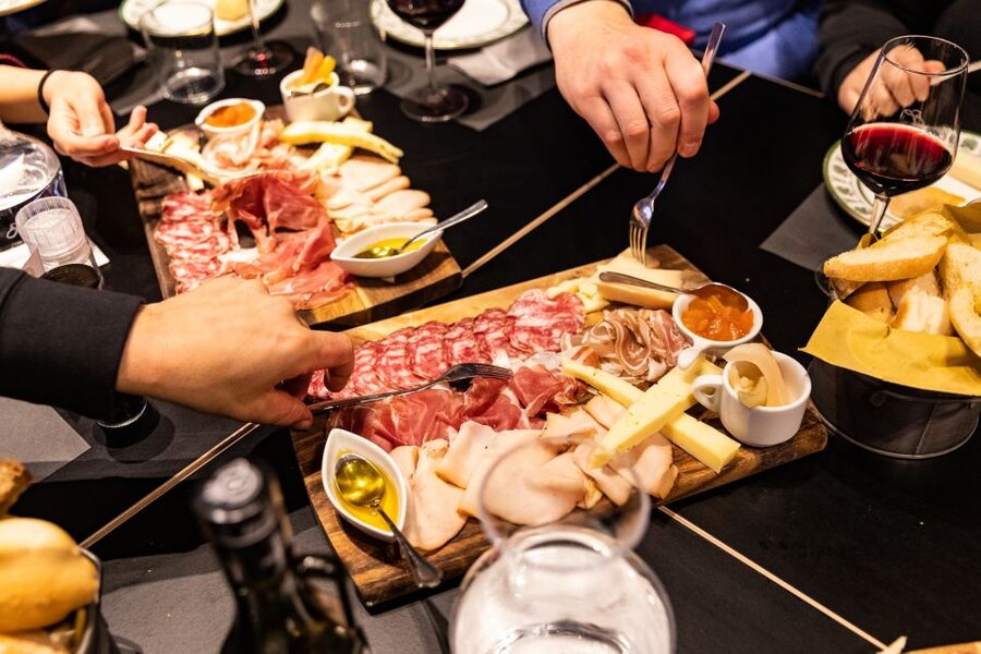 Verona: City Highlights & Street Food Walking Tour - How much value does the four-hour tour offer?