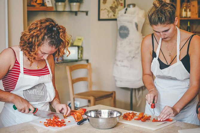 Verona: Italian Cooking Class with Pasta, Risotto and Tiramisù - Stirring risotto with a taste of Verona